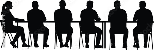 Silhouettes of People Sitting Around a Table in a Meeting or Conference group