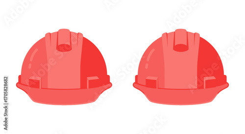 Two bright red hard hats symbolizing safety and construction work