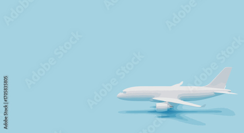 Sleek white airplane model glides across a minimalist light blue background, evoking travel and freedom.