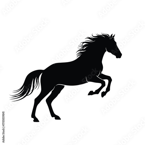 A powerful black silhouette of a majestic horse rearing up on its hind legs with a flowing mane and tail.