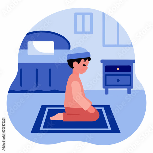 Young Muslim boy praying on prayer mat in bedroom at home  
