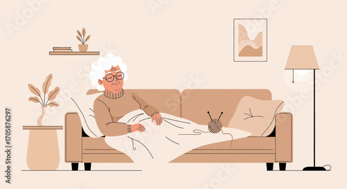 Cozy Senior Relaxing on Sofa with Knitting, Creating Warmth and Comfort