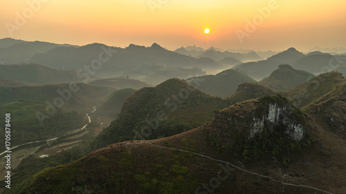 Slika na platnu Dawn on the high mountain peaks of Ha Lang area, with pack horses and people going to work