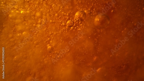 Macro Shot of Beer Bubbles ...