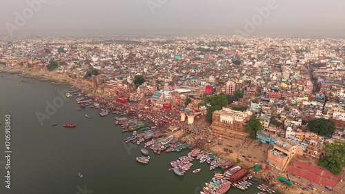 Varanasi, India: Aerial view of famous Dashashwamedh Ghat in ancient holy city on Ganges river - landscape panorama of Southeast Asia from above
