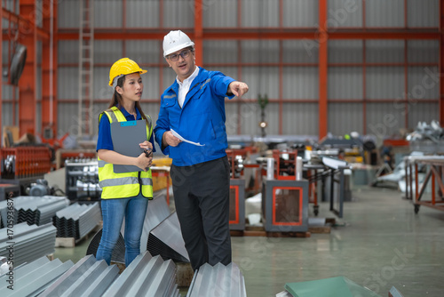 Safety training session construction site professionals discussing industrial environment collaborative viewpoint workplace safety