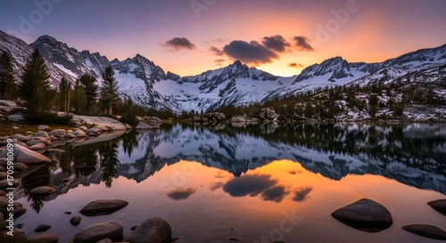 Scenic Mountain Lake with Reflection of Snow Peaks 