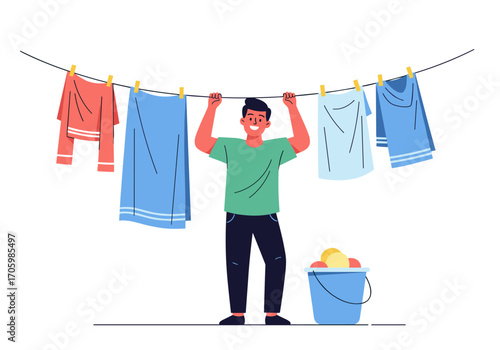 Man hanging clothes on a clothesline outdoors.