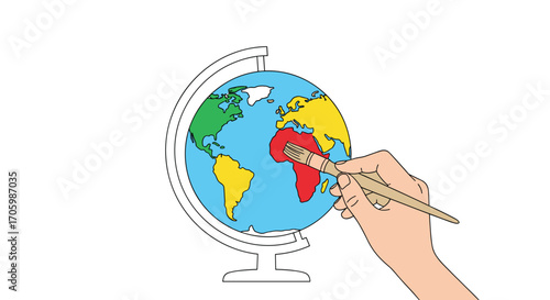 Hand painting the globe with a paintbrush