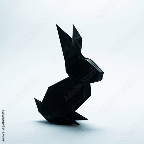 Black origami rabbit silhouette isolated on white background