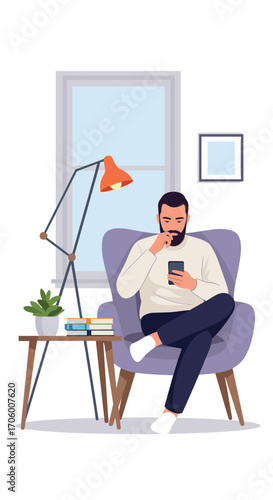 A man sitting in a comfortable chair with a lamp and a plant nearby.