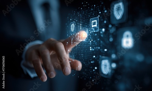 Hand touching futuristic digital security icons floating in the air, with a dark blue background. The hand is blurred in the background