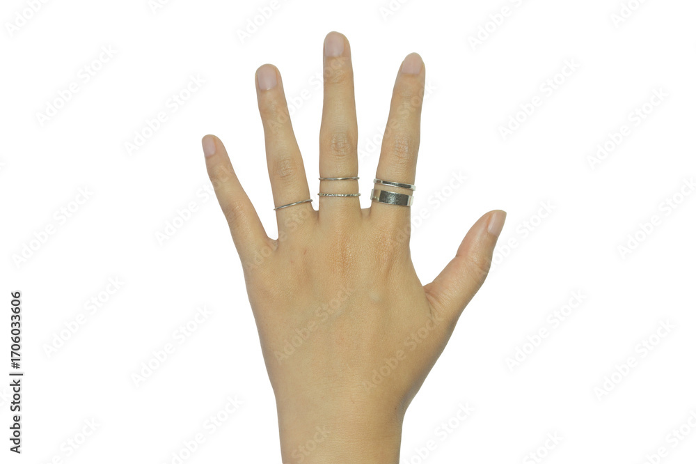 Fototapeta premium Elegant hand adorned with delicate rings against a stark transparent backdrop offering stylistic