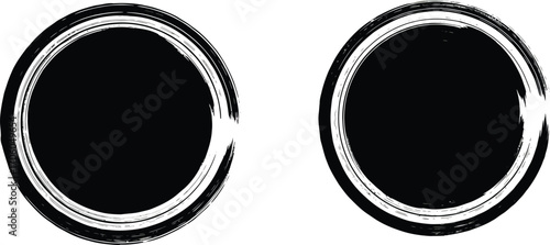 two black oval shapes with white borders side by side