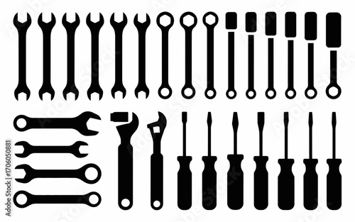 Vector art of black silhouette wrenches and screwdrivers