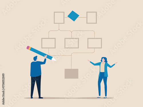 Two people collaborate to build a flowchart or organizational structure using a large pencil and empty boxes