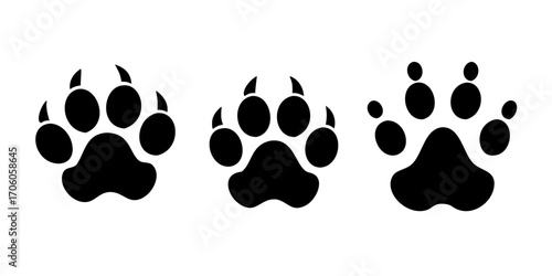 Different animal paw print vector illustrations .Sixteen black paw print icons each with a different animal silhouette inside vector illustration
