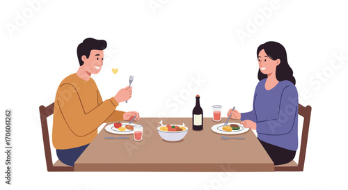 Happy young couple enjoying a romantic dinner together at a dining table.