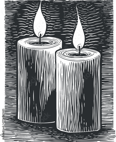 Two intricately designed candles with flames, evoking warmth and tranquility in any setting.