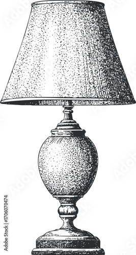 Vintage table lamp with a decorative shade and ornate base ideal for home decor