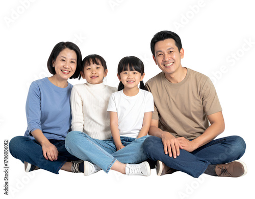 A family of four sitting together, smiling, against a plain  on a transparent background.