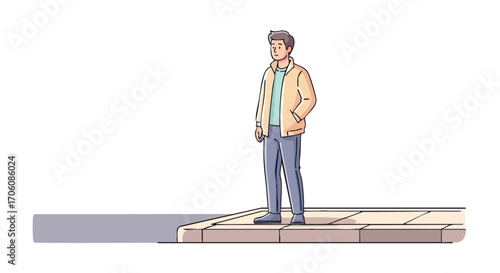 Young man in a casual jacket standing alone on a sidewalk curb hand in pocket.
