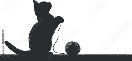 A playful silhouette of a cat engaging with a ball of yarn against a minimalist background.