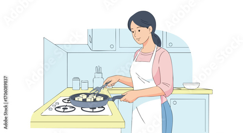 Young woman in a white apron cooking cubed tofu in a frying pan on a gas stove.