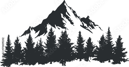 Silhouette of a majestic mountain range with dense forest in the foreground.