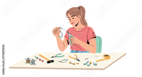 Young woman with a ponytail crafting handmade beaded jewelry at a desk with tools.
