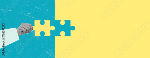 Hands connecting puzzle pieces to illustrate teamwork and collaboration in a creative project setting