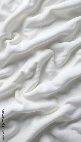 Crisp white fabric with subtle wrinkle patterns.