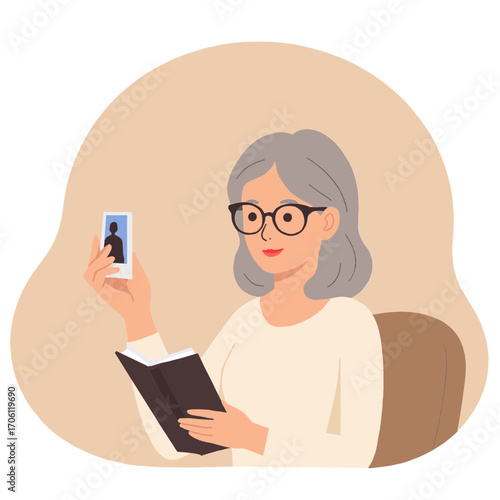 Senior woman holding photo. Elderly lady looking at old photograph. Older woman remembering past through picture. Retired woman cherishing family photo. Elderly set