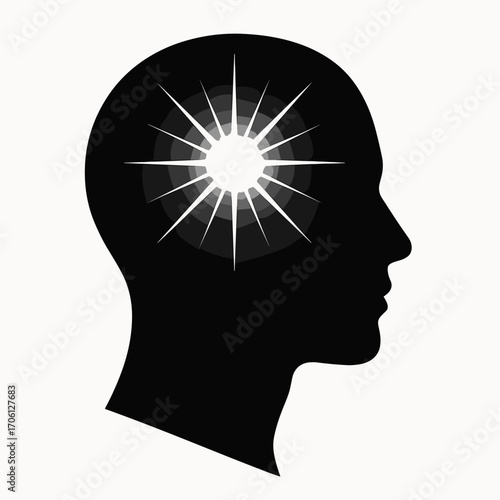 Minimalist human head silhouette with a bright light symbolizing enlightenment
