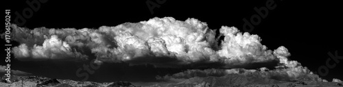 thunderclouds near mountains