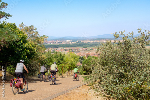 Bikers on the Camino de Santiago with a cross