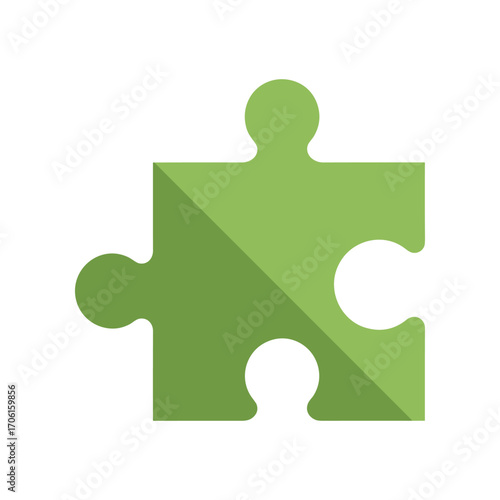 A green puzzle piece symbolizing problem-solving and teamwork in a creative workspace