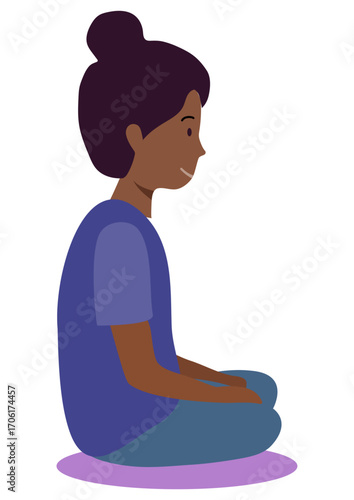 Young girl sitting calmly on a rug. Kid student meditating or listening in class. Early childhood education and primary school concept.