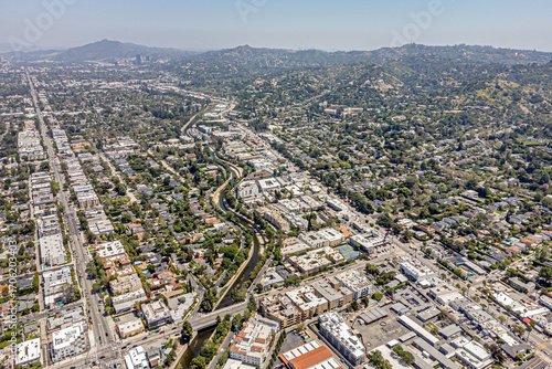Studio City, LA Los Angeles County, CA, California, April 30, 2024: Aerial Drone City View toward Studio City, LA River, Ventura Blvd, with Homes, Houses, Streets, Apartments, Buildings
