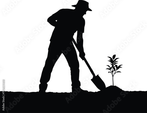 Silhouette of Farmer Planting a Sapling