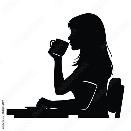 Silhouette of a woman enjoying a hot beverage at a desk silhouette