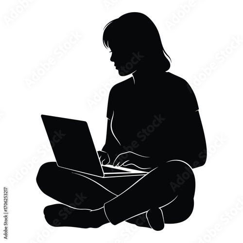 Silhouette of a person sitting cross-legged typing on a laptop computer silhouette