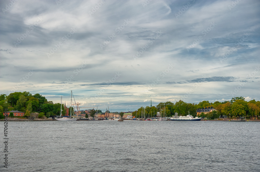 Obraz premium Stockholm, the capital of Sweden, encompasses 14 islands and more than 50 bridges in a vast archipelago in the Baltic Sea.