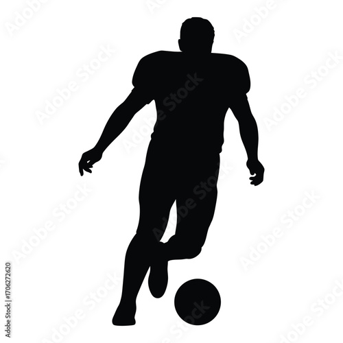 Dynamic silhouette of a soccer player kicking a ball during a game silhouette