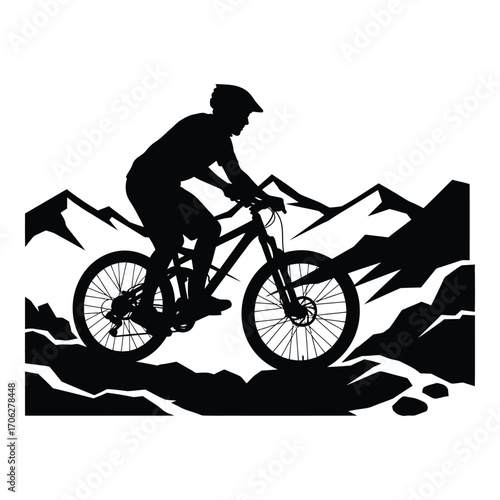 Mountain biker silhouette riding down rugged mountain trail silhouette