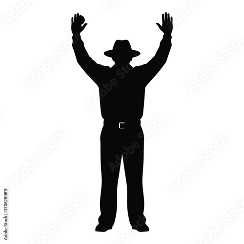Silhouette of an umpire signaling a home run or out with arms raised silhouette
