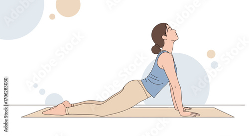 Serene Woman Performing Cobra Pose Yoga Exercise for Relaxation and Mindfulness