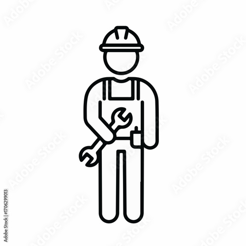 Skilled worker in hard hat holding a wrench, ready for construction and repair tasks.