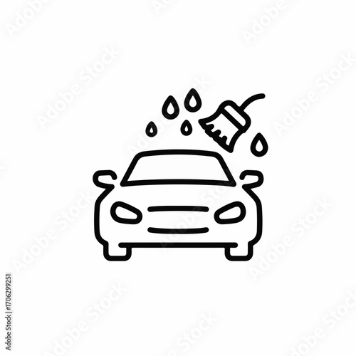 Clean car receiving a rinse with water droplets and a brush.