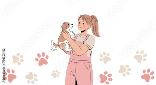 Woman Affectionately Cradles Puppy Against White Backdrop Decorated With Pawprints
